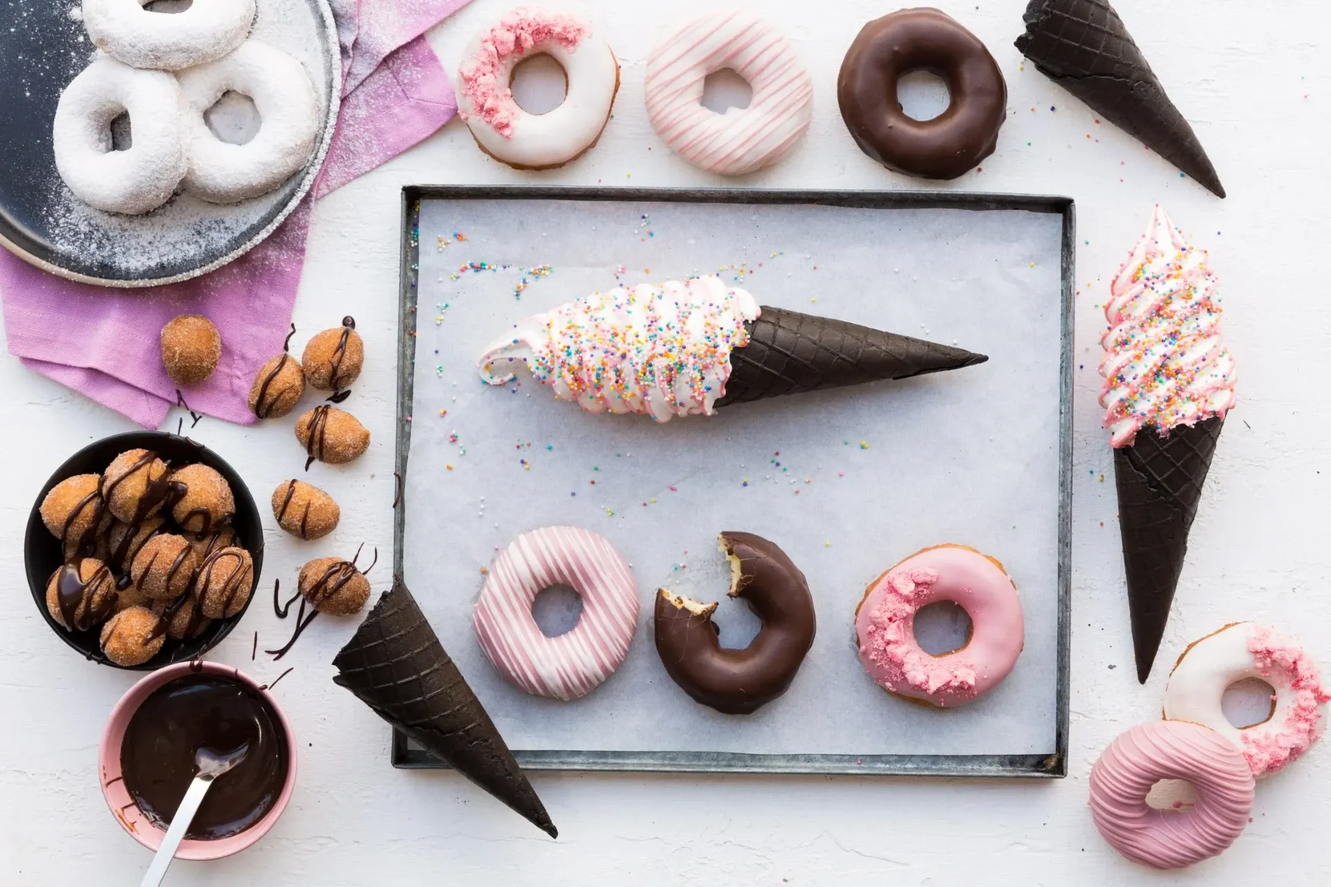 Colourful assorted donuts and soft serve background